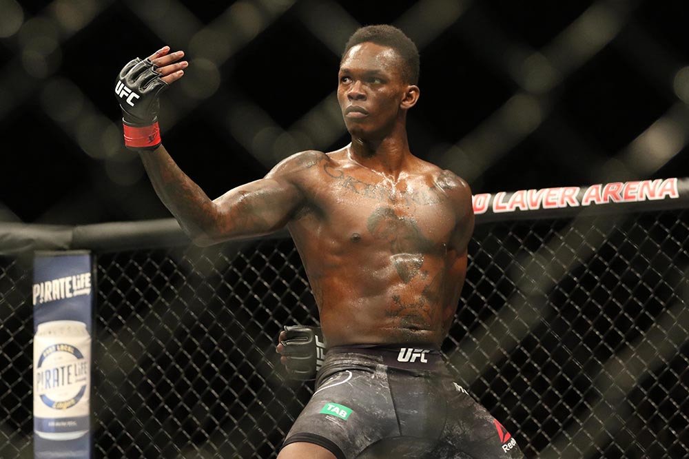 Israel Adesanya's coach explains why his students are such good strikers in the UFC -